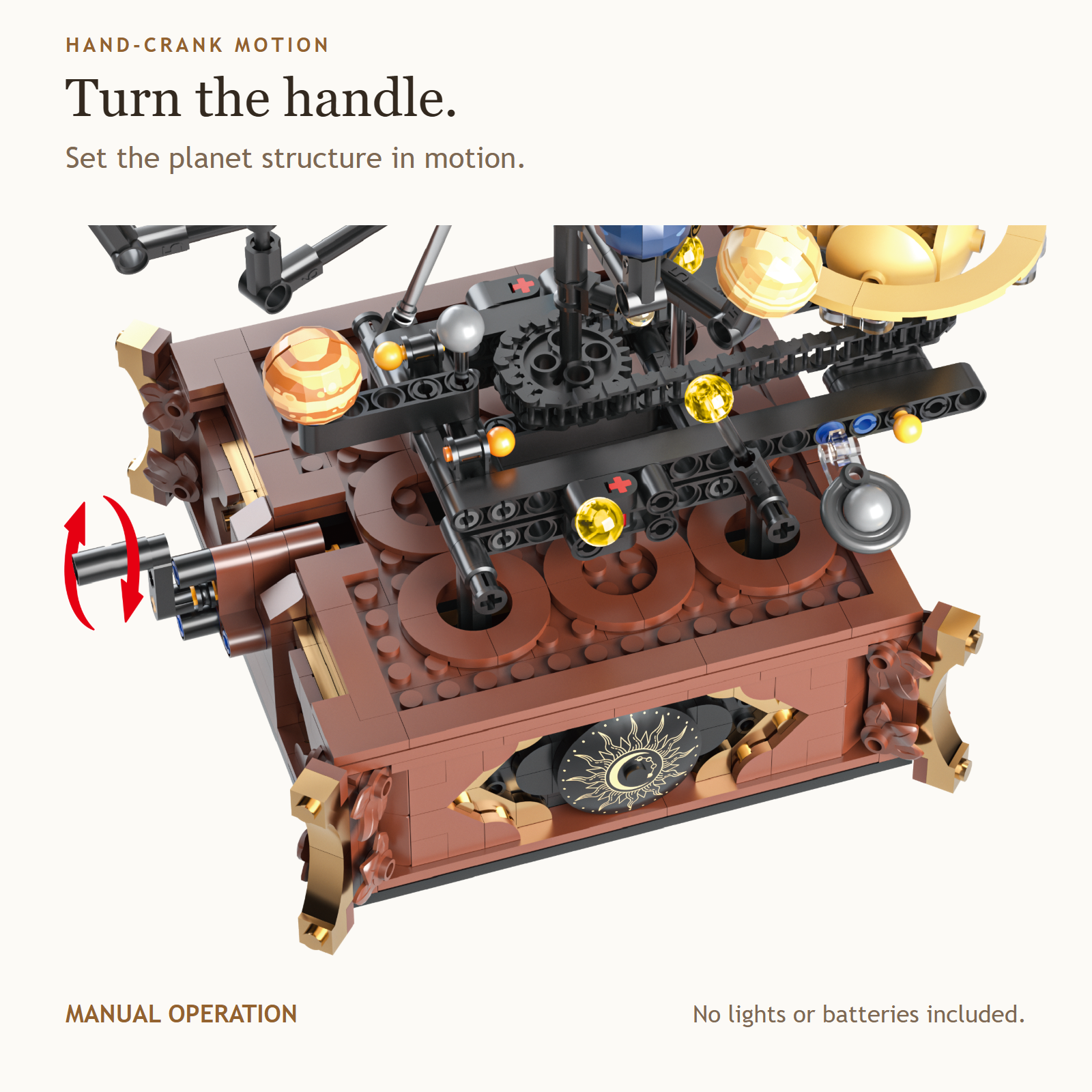 Close-up of the original model showing the hand crank, visible gears and support structure; the red arrow indicates manual turning.